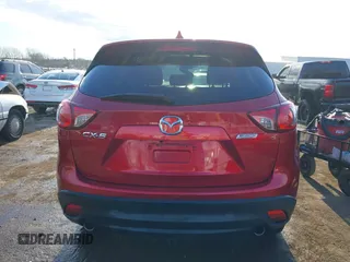 2015 Mazda CX-5 Sport z VIN JM3KE2BE7F0516869, wystawiony jako IAAI lot #41866488 z przebiegiem 131 237 mil mil oraz . Historia ofert i sprzedaży dostępna na DreamBid. Obrazek 16.