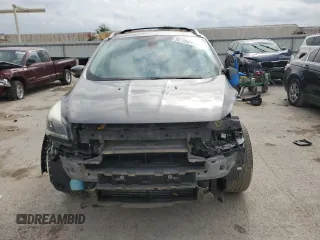 2013 Ford Escape Titanium z VIN 1FMCU0J98DUB64363, wystawiony jako Copart lot #54772925 z przebiegiem 109 956 mil mil oraz Szkody całkowita. Historia ofert i sprzedaży dostępna na DreamBid. Obrazek 5.