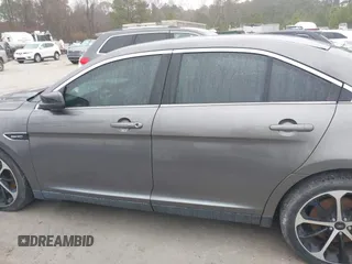 2014 Ford Taurus SHO with VIN 1FAHP2KT0EG171336, listed as a IAAI auction lot 41566688 with 154,328 mi miles. Bid and sale history available at carsss.com. Image 14.