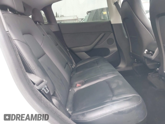 2023 Tesla Model Y Long Range with VIN 7SAYGDEE9PA094191, listed as a IAAI auction lot 41906319 with 15,240 mi miles and . Bid and sale history available at DreamBid. Image 8.