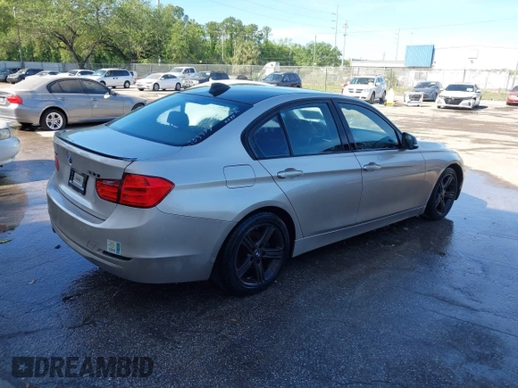 2015 BMW 3 Series 320i with VIN WBA3B1G58FNT03373, listed as a IAAI auction lot 41843859 with 98,439 mi miles. Bid and sale history available at carsss.com. Image 4.