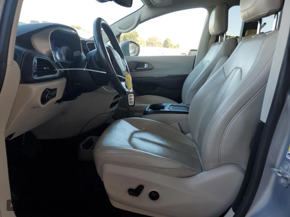 2021 Chrysler Pacifica Hybrid Touring L with VIN 2C4RC1L7XMR593911, listed as a Copart auction lot 57842415 with 74,910 mi miles and Salvage title. Bid and sale history available at DreamBid. Image 7.