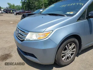 2011 Honda Odyssey EX-L with VIN 5FNRL5H60BB051135, listed as a IAAI auction lot 42588994 with 195,112 mi miles and . Bid and sale history available at DreamBid. Image 6.