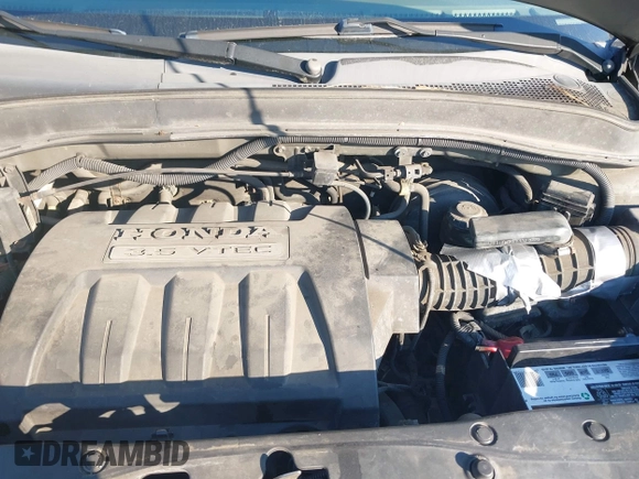 2006 Honda Pilot EX-L with VIN 5FNYF18766B026721, listed as a IAAI auction lot 41690993 with 219,473 mi miles and . Bid and sale history available at DreamBid. Image 10.