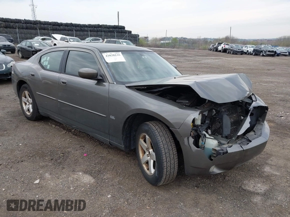 2010 Dodge Charger SXT with VIN 2B3CA3CV7AH165769, listed as a IAAI auction lot 42038135 with 200,886 mi miles. Bid and sale history available at carsss.com. Image 1.