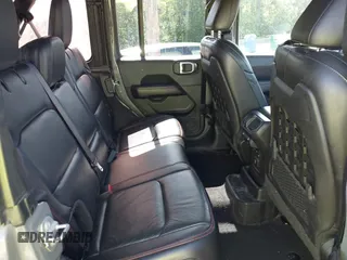 2018 Jeep Wrangler Unlimited Rubicon with VIN 1C4HJXFG6JW267087, listed as a IAAI auction lot 42235058 with 93,962 mi miles and . Bid and sale history available at DreamBid. Image 8.