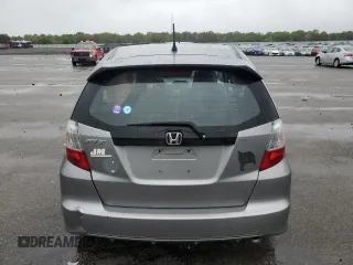 2010 Honda Fit Sport with VIN JHMGE8H40AC017384, listed as a Copart auction lot 58226445 with 138,453 mi miles and Salvage title. Bid and sale history available at DreamBid. Image 6.