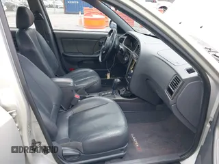 2003 Hyundai Elantra GT z VIN KMHDN55D13U099447, wystawiony jako IAAI lot #41973749 z przebiegiem 200 923 mil mil oraz . Historia ofert i sprzedaży dostępna na DreamBid. Obrazek 5.