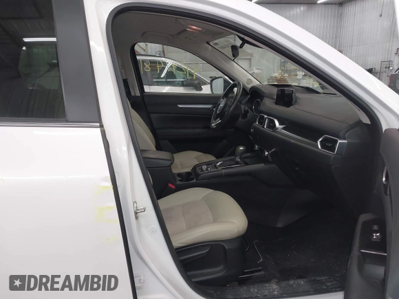2017 Mazda CX-5 Touring with VIN JM3KFBCL9H0107589, listed as a IAAI auction lot 41241481 with 77,032 mi miles. Bid and sale history available at carsss.com. Image 5.