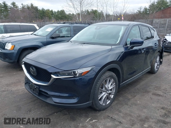 2020 Mazda CX-5 Grand Touring with VIN JM3KFBDM7L1723852, listed as a IAAI auction lot 41848152 with 85,099 mi miles. Bid and sale history available at carsss.com. Image 2.
