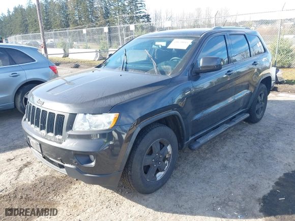 2011 Jeep Grand Cherokee Laredo with VIN 1J4RR4GG2BC670264, listed as a IAAI auction lot 41670045 with 252,044 mi miles. Bid and sale history available at carsss.com. Image 17.