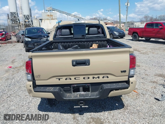 2020 Toyota Tacoma SR5 z VIN 3TMCZ5AN1LM300447, wystawiony jako IAAI lot #41961434 z przebiegiem 42 090 mil mil oraz . Historia ofert i sprzedaży dostępna na DreamBid. Obrazek 16.