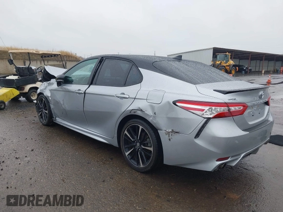2020 Toyota Camry XSE with VIN 4T1K61AK1LU318098, listed as a IAAI auction lot 41097712 with 64,118 mi miles and . Bid and sale history available at DreamBid. Image 3.