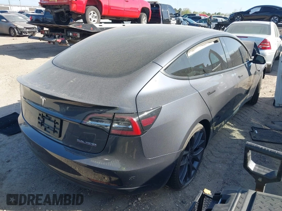 2022 Tesla Model 3 Performance with VIN 5YJ3E1EC3NF194197, listed as a IAAI auction lot 41825401 with Not Provided miles and . Bid and sale history available at DreamBid. Image 4.