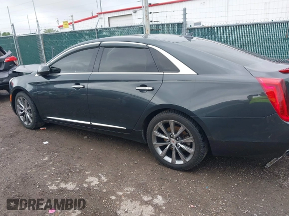 2013 Cadillac XTS Luxury с VIN 2G61R5S34D9171508, выставлен на аукционе IAAI как лот 42336568 с пробегом 98 997 миль миль и . История ставок и продаж доступна на DreamBid. Изображение 14.