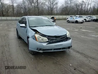 2008 Ford Focus SE z VIN 1FAHP33N48W204502, wystawiony jako Copart lot #53145615 z przebiegiem Nie podano mil oraz Szkoda całkowita • Salvage title. Historia ofert i sprzedaży dostępna na DreamBid. Obrazek 11.