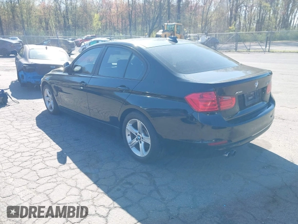 2013 BMW 3 Series 328i xDrive with VIN WBA3B5G53DNS04643, listed as a IAAI auction lot 42143365 with 107,448 mi miles. Bid and sale history available at carsss.com. Image 3.