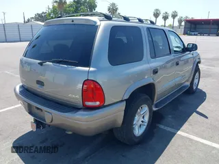 2001 Dodge Durango z VIN 1B4HS28ZX1F520696, wystawiony jako IAAI lot #42505170 z przebiegiem 72 299 mil mil oraz . Historia ofert i sprzedaży dostępna na DreamBid. Obrazek 4.