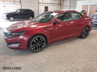 2012 Kia Optima LX with VIN 5XXGM4A75CG020124, listed as a IAAI auction lot 41748367 with 214,760 mi miles. Bid and sale history available at carsss.com. Image 2.