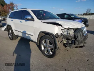 2013 Jeep Grand Cherokee Overland with VIN 1C4RJECG9DC644823, listed as a Copart auction lot 83232414 with 193,205 mi miles and Salvage Title. Bid and sale history available at carsss.com. Image 4.