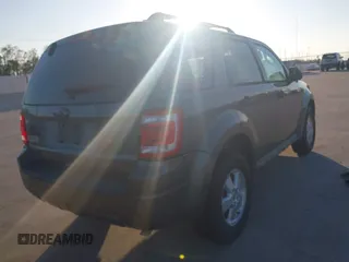 2011 Ford Escape XLT with VIN 1FMCU0D70BKA27369, listed as a IAAI auction lot 40970437 with 119,719 mi miles. Bid and sale history available at carsss.com. Image 4.