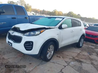 2018 Kia Sportage LX z VIN KNDPMCAC3J7394485, wystawiony jako IAAI lot #41106807 z przebiegiem 104 865 mil mil oraz . Historia ofert i sprzedaży dostępna na DreamBid. Obrazek 2.