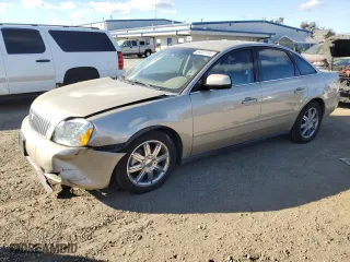 2005 Mercury Montego Premier with VIN 1MEHM42165G617341, listed as a Copart auction lot 88297195 with 82,384 mi miles and Salvage Title. Bid and sale history available at carsss.com. Image 1.