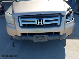 2006 Honda Pilot EX-L with RES with VIN 5FNYF28606B049523, listed as a IAAI auction lot 41736427 with 274,199 mi miles. Bid and sale history available at carsss.com. Image 15.