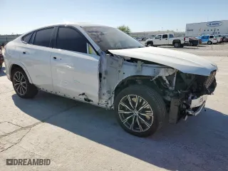 2020 BMW X6 xDrive40i with VIN 5UXCY6C00L9D45082, listed as a Copart auction lot 52588665 with 40,810 mi miles and Salvage Title. Bid and sale history available at carsss.com. Image 4.