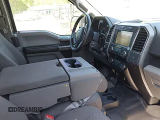 2019 Ford F-150 XL z VIN 1FTEX1C51KFA73506, wystawiony jako IAAI lot #42065274 z przebiegiem 144 397 mil mil oraz . Historia ofert i sprzedaży dostępna na DreamBid. Obrazek 5.