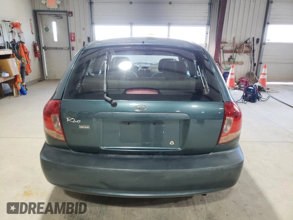 2004 Kia Rio with VIN KNADC165846199316, listed as a Copart auction lot 51158965 with 158,978 mi miles and Salvage Title. Bid and sale history available at carsss.com. Image 6.
