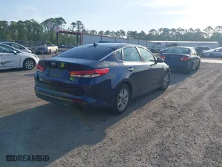 2017 Kia Optima LX with VIN 5XXGT4L35HG174613, listed as a IAAI auction lot 42097790 with 243,335 mi miles. Bid and sale history available at carsss.com. Image 4.