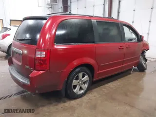 2009 Dodge Grand Caravan SE with VIN 2D8HN44E89R698072, listed as a IAAI auction lot 41649569 with 188,433 mi miles. Bid and sale history available at carsss.com. Image 4.