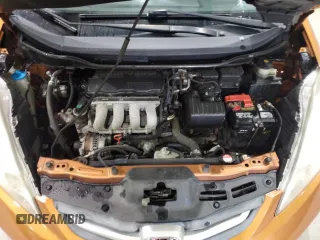 2009 Honda Fit Sport z VIN JHMGE88439S058349, wystawiony jako Copart lot #56873185 z przebiegiem 117 523 mil mil oraz Szkoda całkowita • Salvage title. Historia ofert i sprzedaży dostępna na DreamBid. Obrazek 11.