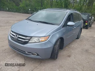 2014 Honda Odyssey Touring with VIN 5FNRL5H91EB081811, listed as a IAAI auction lot 42153920 with 16 mi miles and . Bid and sale history available at DreamBid. Image 17.