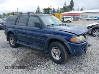 2001 Mitsubishi Montero ES z VIN JA4MT21H11P014632, wystawiony jako IAAI lot #42244292 z przebiegiem 197 139 mil mil oraz . Historia ofert i sprzedaży dostępna na DreamBid. Obrazek 1.