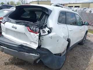 2019 Jeep Cherokee Limited with VIN 1C4PJMDN9KD180308, listed as a IAAI auction lot 42178830 with 164,453 mi miles and . Bid and sale history available at DreamBid. Image 4.