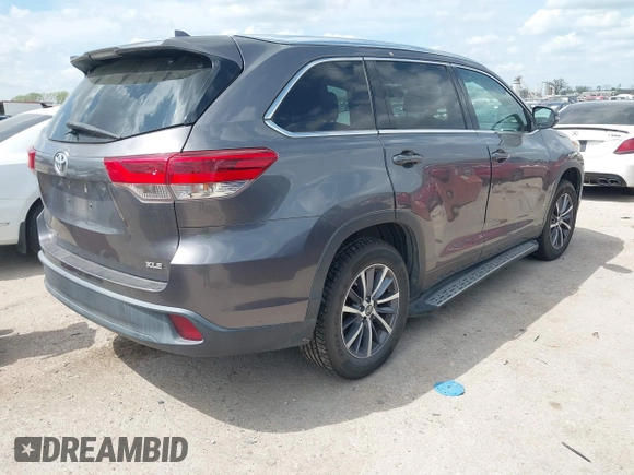 2018 Toyota Highlander SE with VIN 5TDKZRFH9JS544012, listed as a IAAI auction lot 41885296 with 144,500 mi miles and . Bid and sale history available at DreamBid. Image 4.