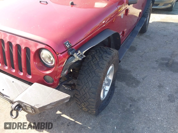 2011 Jeep Wrangler Unlimited Sport with VIN 1J4BA3H18BL598323, listed as a IAAI auction lot 41958043 with 154,354 mi miles. Bid and sale history available at carsss.com. Image 6.