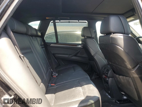 2012 BMW X5 35i z VIN 5UXZV4C51CL744313, wystawiony jako Copart lot #58270755 z przebiegiem 97 903 mil mil oraz Szkoda całkowita • Salvage title. Historia ofert i sprzedaży dostępna na DreamBid. Obrazek 10.