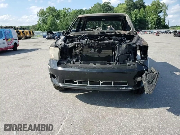 2012 Ram 1500 Express with VIN 1C6RD7KT4CS196472, listed as a Copart auction lot 61826425 with Not provided miles and Salvage title. Bid and sale history available at DreamBid. Image 12.