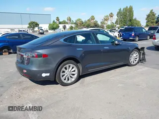 2018 Tesla Model S 75D with VIN 5YJSA1E26JF249573, listed as a IAAI auction lot 42748801 with 88,467 mi miles and . Bid and sale history available at DreamBid. Image 4.