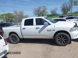 2014 Ram 1500 Express z VIN 1C6RR7KT3ES170854, wystawiony jako IAAI lot #42203099 z przebiegiem 207 634 mil mil oraz . Historia ofert i sprzedaży dostępna na DreamBid. Obrazek 13.
