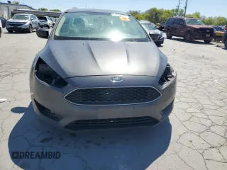 2018 Ford Focus SE with VIN 1FADP3F25JL214690, listed as a Copart auction lot 53538425 with 139,650 mi miles and Salvage title. Bid and sale history available at DreamBid. Image 5.