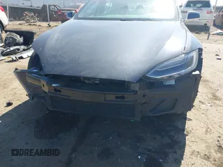2018 Tesla Model S 75D with VIN 5YJSA1E21JF287115, listed as a IAAI auction lot 41850318 with Not provided miles and . Bid and sale history available at DreamBid. Image 6.