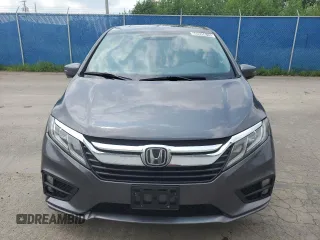 2018 Honda Odyssey with VIN 5FNRL6H49JB504977, listed as a Copart auction lot 60905615 with 180,464 mi miles and Clean title. Bid and sale history available at DreamBid. Image 5.