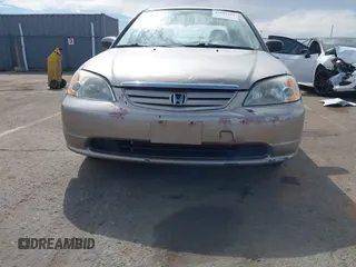 2001 Honda Civic LX with VIN 2HGES16511H554168, listed as a IAAI auction lot 42009621 with 163,801 mi miles. Bid and sale history available at carsss.com. Image 18.