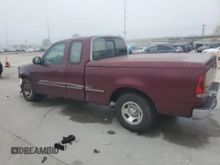 1997 Ford F-150 with VIN 2FTDX1726VCA74811, listed as a Copart auction lot 81909844 with 136,520 mi miles and Salvage title. Bid and sale history available at DreamBid. Image 2.