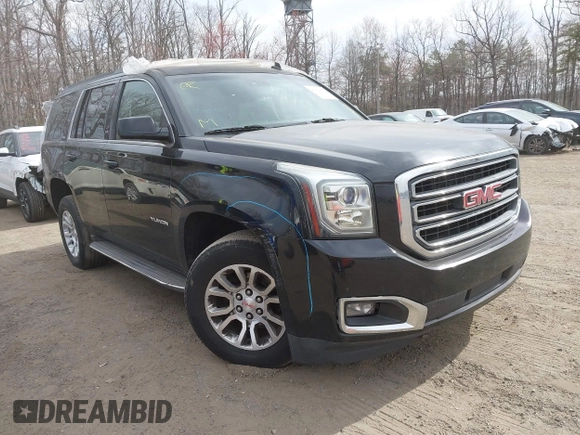2015 GMC Yukon SLT z VIN 1GKS1BKCXFR192349, wystawiony jako IAAI lot #41842474 z przebiegiem 185 166 mil mil oraz . Historia ofert i sprzedaży dostępna na DreamBid. Obrazek 1.