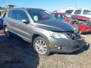 2011 Volkswagen Tiguan SE with VIN WVGBV7AX7BW538690, listed as a IAAI auction lot 41338881 with Not Provided miles and . Bid and sale history available at DreamBid. Image 1.